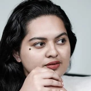 Anmary Jiju K in a meeting
