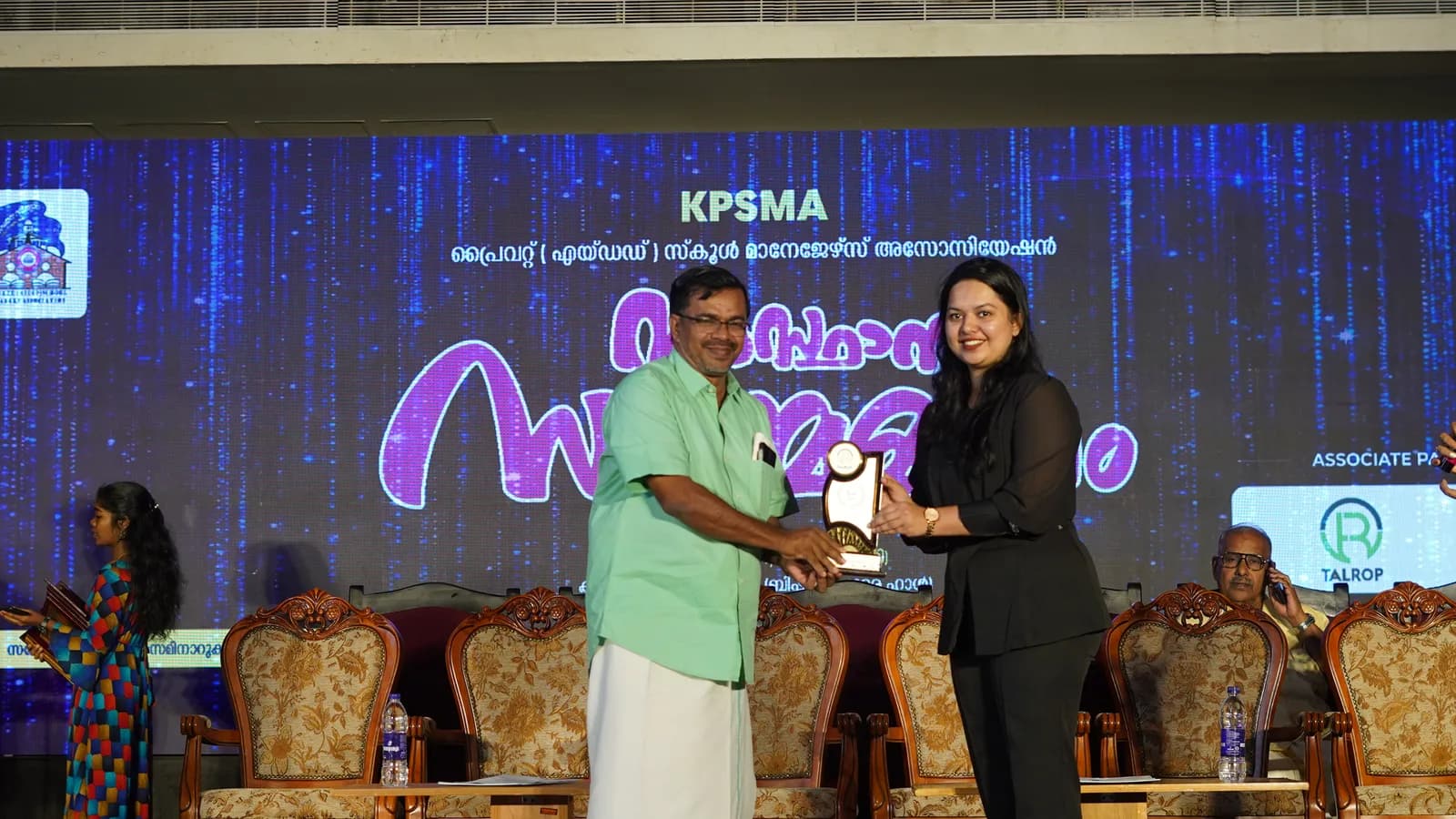 Receiving an award on stage