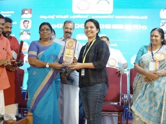 On stage with the award